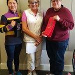 2016 Club Foursome Champions Young Mi Ko & Julie Crafter receiving Event Winner towels from Merrilyn Middleton